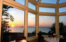 A view of the sunset over Lake Michigan from the dining room at Blu.